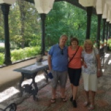 On the porch of beautiful Bellu Manor House during tour, Aug. 2022